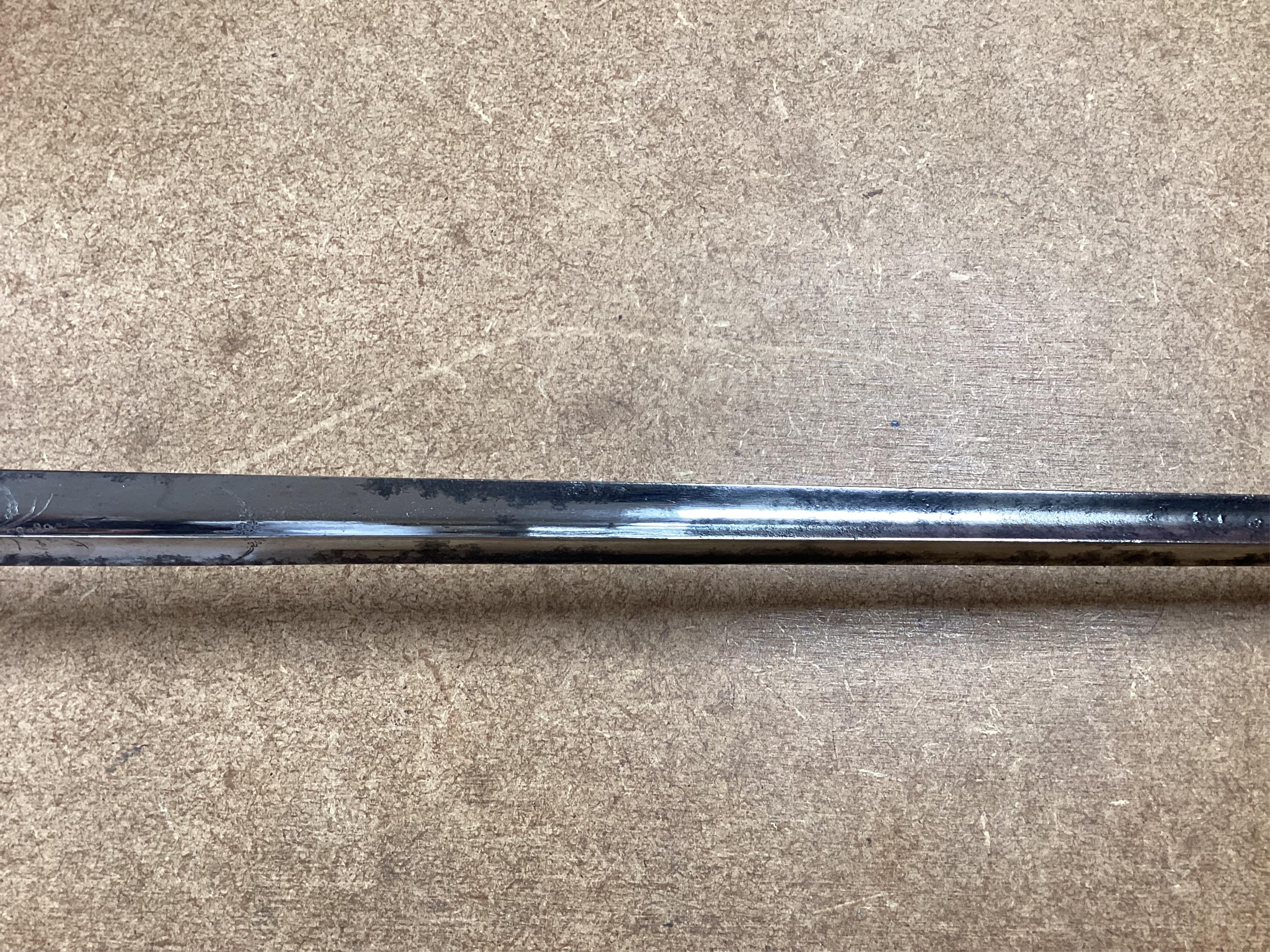 A late 18th century court sword with white metal grip, knuckle guard and mounts, decoration to scabbard band believe to be based on Admiral Duncan’s crest (Camperdown 1797), blade 84cm. Condition - fair to good, some wea